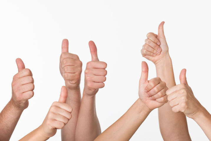 People Giving Thumbs-up