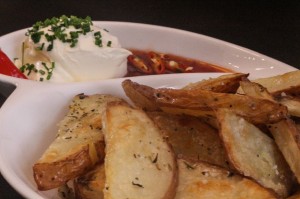 Wedges and sour cream dip