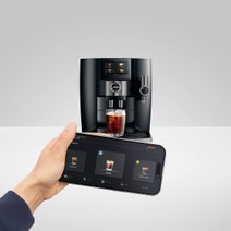 Jura J10 INTA Automatic Coffee Machine Piano Black 15664 hero image