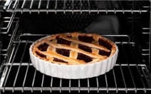 Bertazzoni 120cm Heritage Series 6 Burner + Griddle Plate Cream Dual Fuel Freestanding Oven HER126G2EAVT hero image