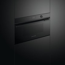 Fisher & Paykel 76cm Series 9 Contemporary Compact Combi-Microwave Oven Black Glass OM76NDTDB1 hero image