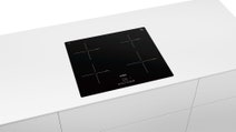 Bosch PUE611BB1E 60cm Serie 4 Induction Cooktop hero image