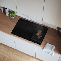 ASKO 80cm 4 Zone Bridge Induction Cooktop - Black HI2842FBG1 hero image
