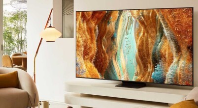 The Samsung 65 Inch QN70F NeoQLED 4K MiniLED Smart AI TV QA65QN70FAWXXY in a living room setting, sold in Australia by Appliances Online