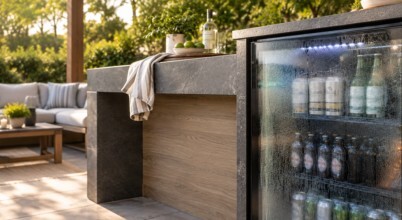 An alfresco outdoor fridge with condensation on its glass doors - AI-generated image