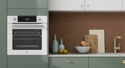 A Haier brand built-in wall oven with integrated air fry functionality.