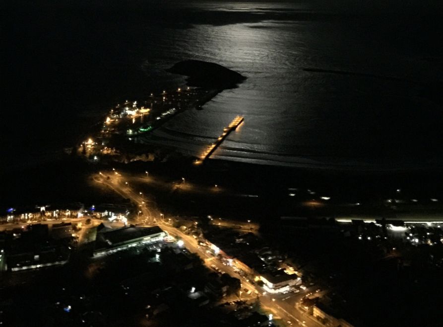 A nighttime view of Coffs Harbour Australia taken from the Appliances Online blimp