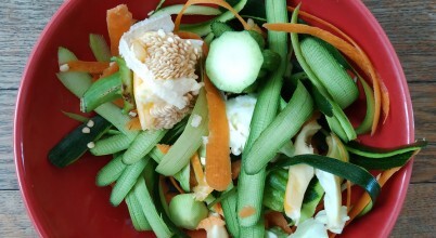 A bowl of vegetable peelings and scraps