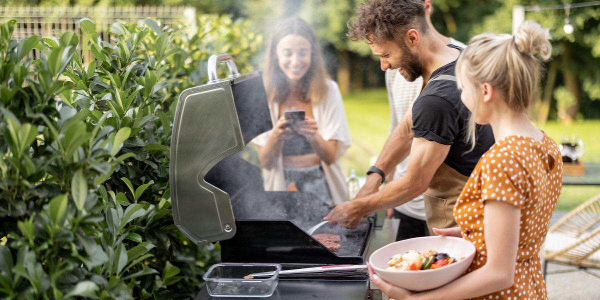 Happy social barbecue cooking