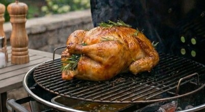 A roast chicken on a BBQ