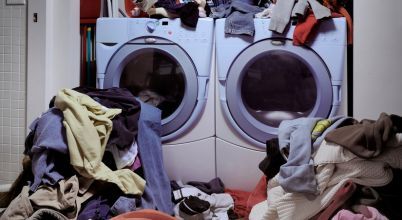 A messy and crowded laundry room