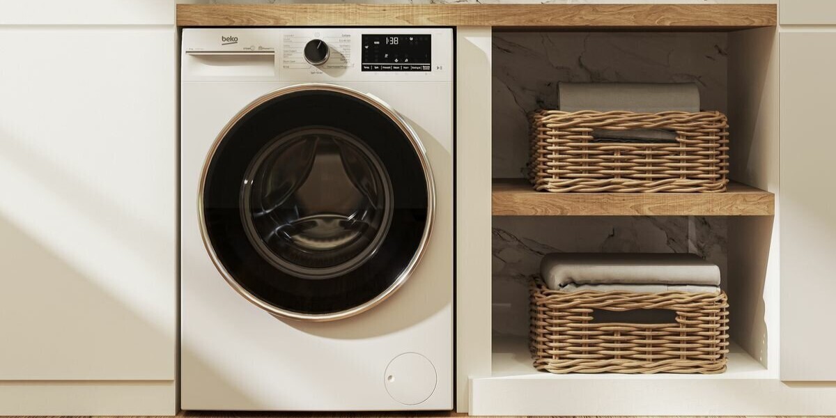 The Beko 9kg Front Load Washing Machine with Autodose and Steam BFLB902ADW in a contemporary laundry setting